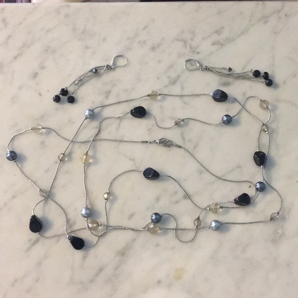Long necklace and matching earring set.
